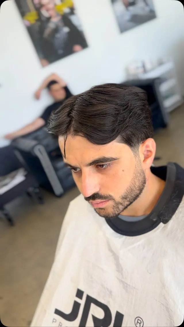 Textured crop with a skin fade, cut at Chop Chopp's Barbershop